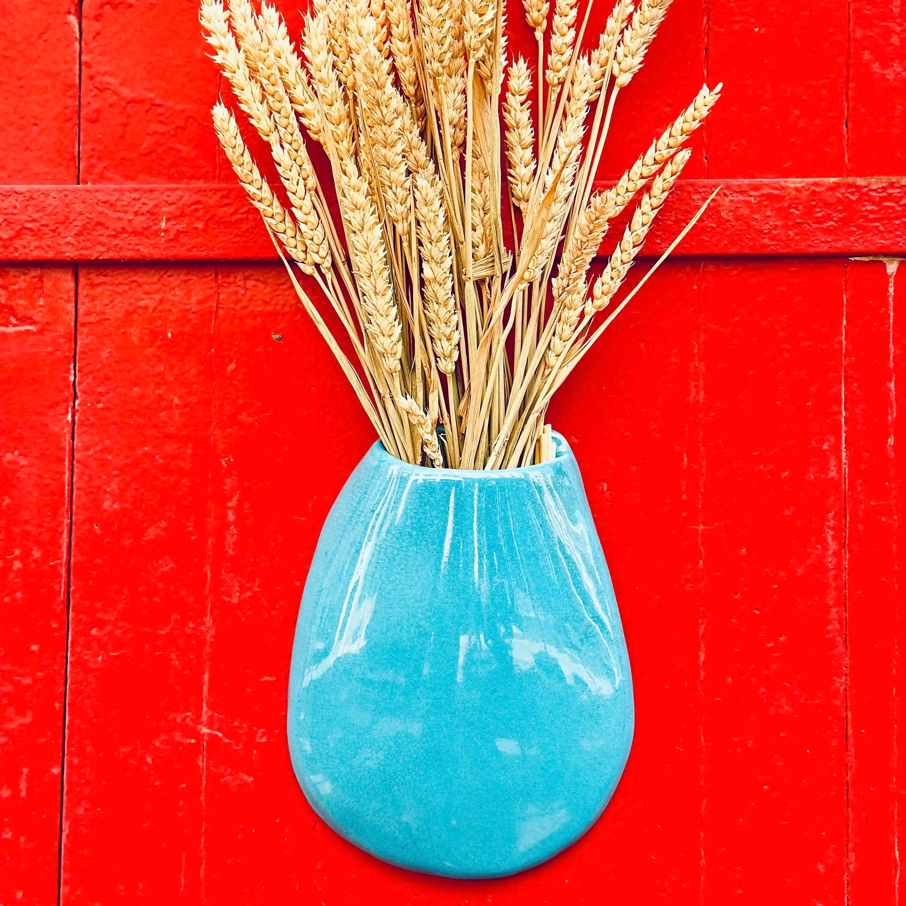 Vase suspendu en céramique, émaillé bleu turquoise brillant, taille environ 24 x 18 cm