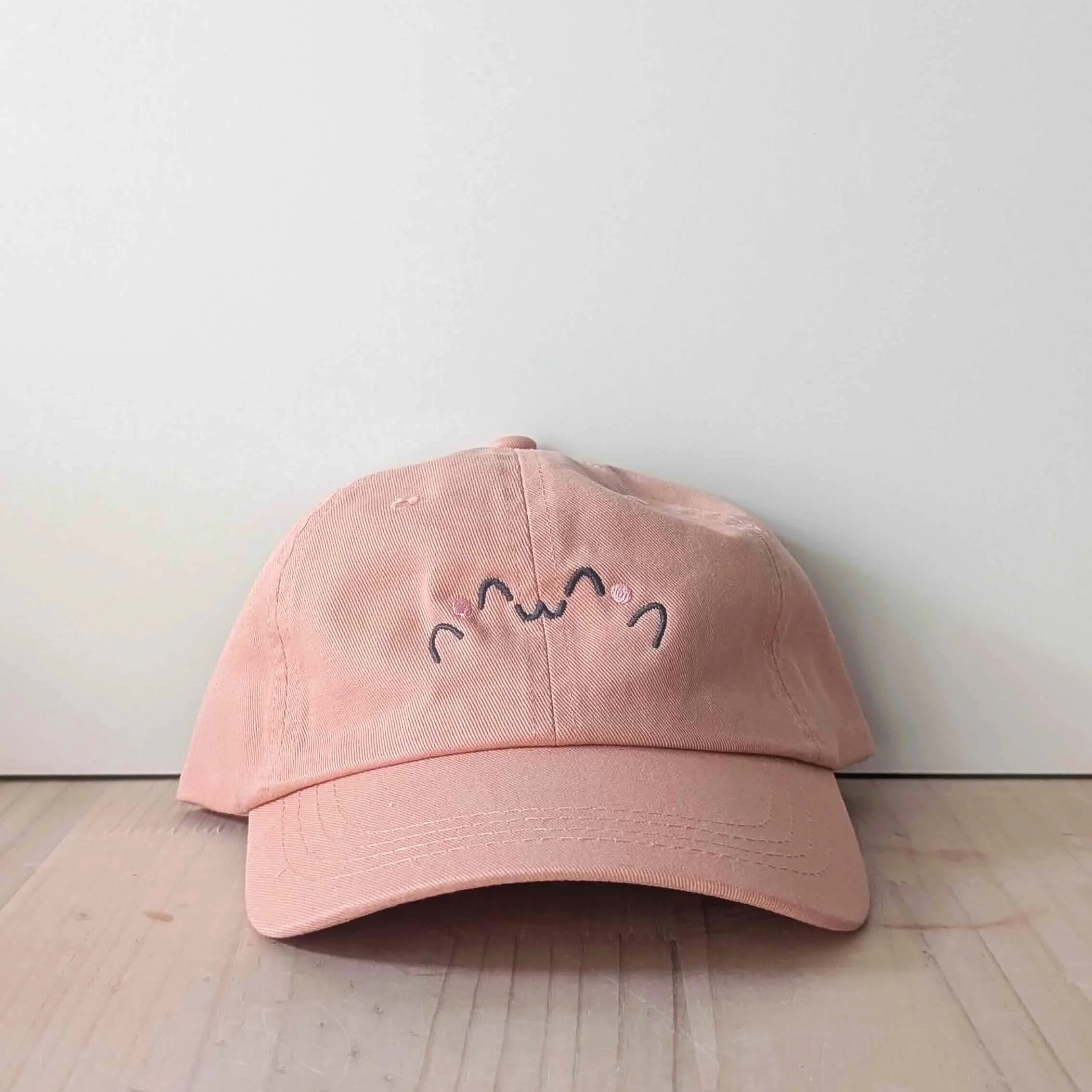 Casquette brodée Happy Face pêche