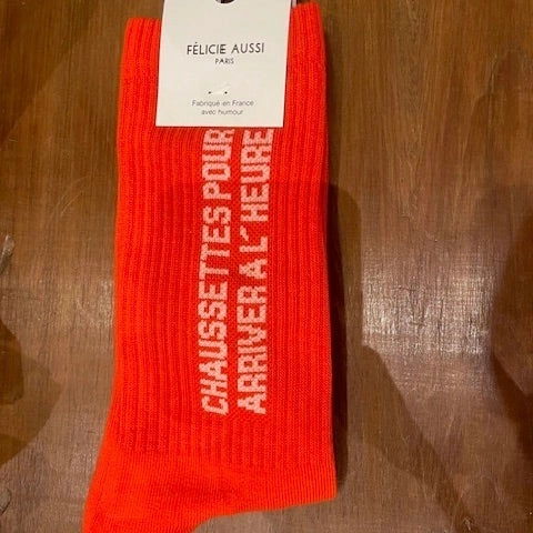 Chaussettes rouge pour arriver à l'heure