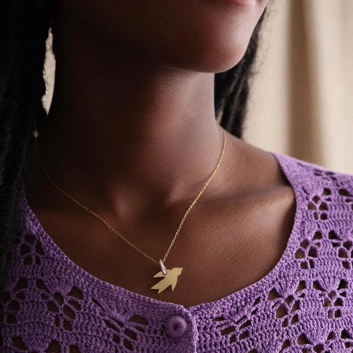 Collier pendentif oiseau