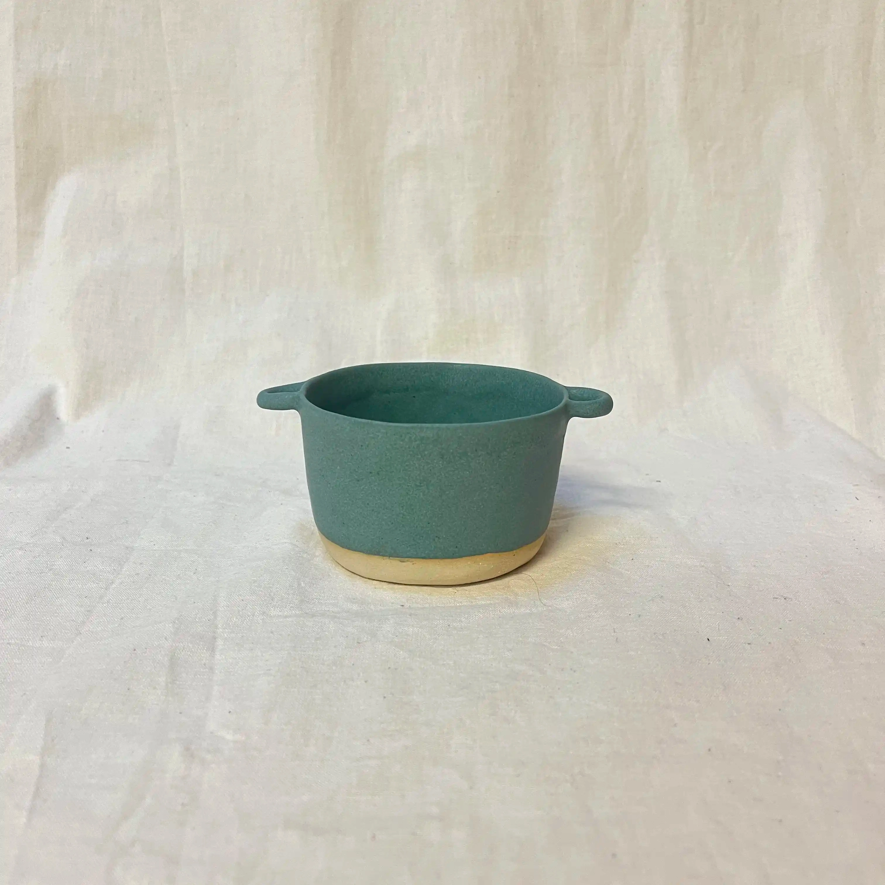 Petit bol pincé avec anses