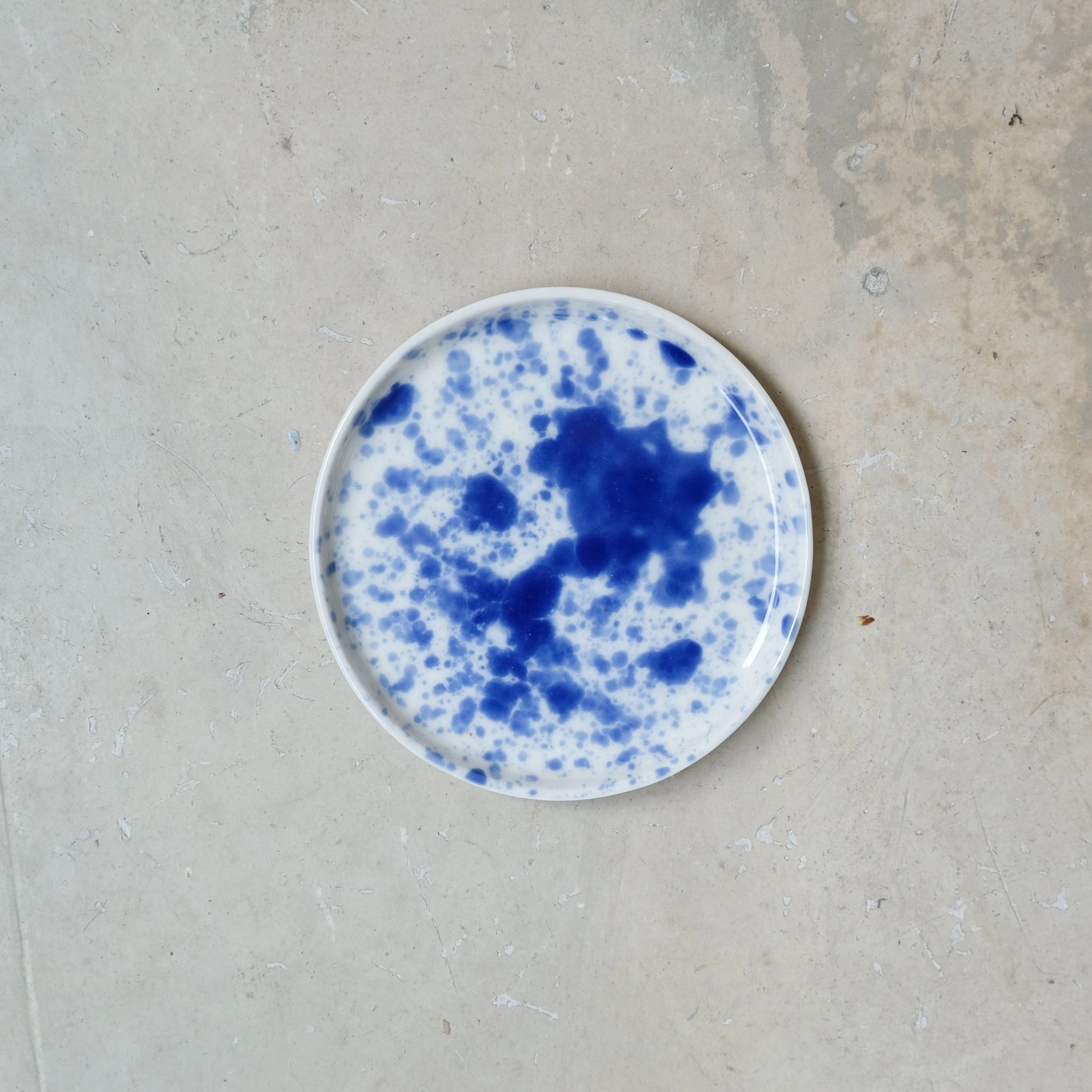 Assiette en porcelaine D 11,5cm- bleu