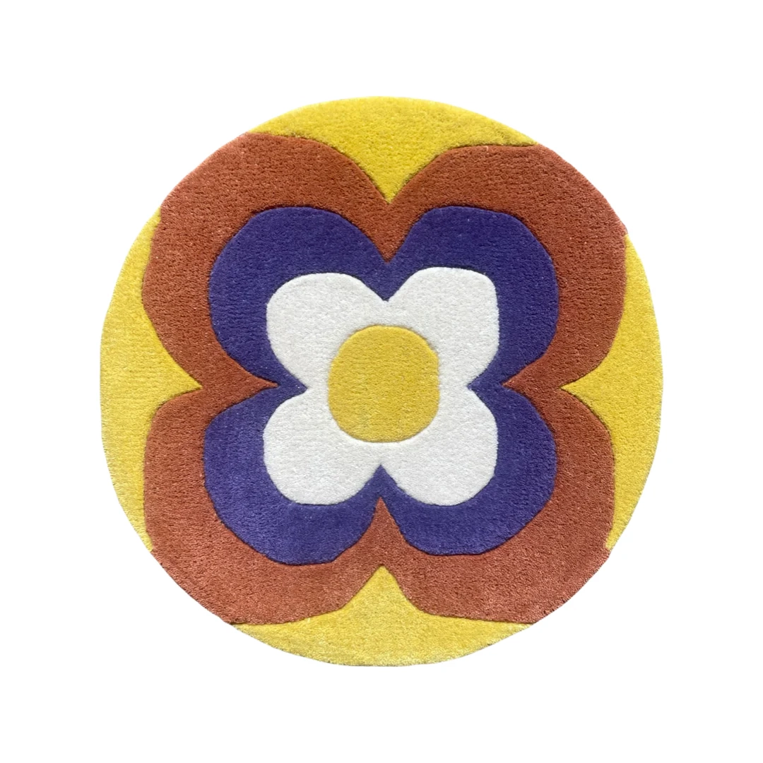 Tapis design Flora dimensions : 50cm. Les tapis sont fabriqués par des artisans qualifiés en Inde, tuftés à la main avec de la laine de Nouvelle Zélande ce qui offre une meilleure densité et une meilleure résistance.